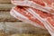 Fresh raw meat pork fresh pork chop bacon rustic wood background