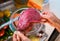 Fresh raw meat on a shelf open refrigerator