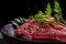 Fresh Raw Meat for Steak New York, Decorated with Herbs and Sprinkled with Peppercorns and Coarse Salt, Lies in a Cast-Iron