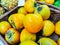 Fresh raw persimmon fruits, cakis, in Autumn season