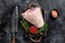 Fresh Raw pork Eisbein knuckle ham in a wooden tray with meat knife. Black Wooden background. Top view