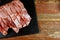 Fresh raw pork ribs of pork meat on chopping board