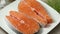 Fresh raw Scottish salmon steaks close up