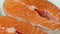 Fresh raw Scottish salmon steaks close up