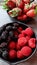 Fresh raw tasty strawberry, raspberry and mulberry rich of vitamin