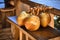 Fresh raw yellow coconuts fruits in interior of cafe.