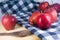 Fresh red apple on wooden table