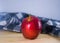 Fresh red apple on wooden table