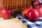 Fresh red apple on wooden table