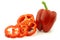 Fresh red bell pepper (capsicum) and a cut one