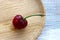 Fresh red berry on a wooden plate, nutrition a healthy lifestyle