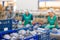 Fresh red cabbage in plastic crates in vegetable factory