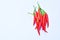 Fresh red chili pepper arranging on white background