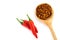 Fresh red chilli pepper and crushed dried red cayenne pepper wit