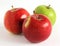 Fresh red and green apples on a white background