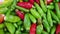 Fresh red and green hot peppers background. Close up. vegetable video