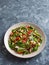 Fresh Red Shard Salad with quinoa and tomatoes. Organic vegetables.