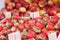 Fresh red Strawberries arranged in wooden boxes baskets ready for sale