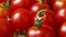 Fresh red sweet cherry tomatoes close up full frame