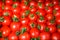Fresh red tomato abstract fruit colorful pattern texture background. Shallow depth of field.