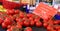 Fresh red tomatoes at a farmer market in France, Europe. Italian tomatoes. Street French market at Nice.