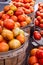 Fresh ripe baskets of tomatoes at a local market