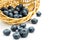 Fresh ripe blueberries in wicker basket