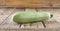 Fresh ripe delicious zucchini on wooden table