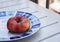 Fresh ripe Donut Flat peach Prunus persica on the plate