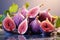 Fresh ripe figs with leaves on the background