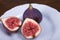 Fresh ripe figs on plate, exotic fruit