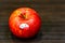 Fresh ripe Gala apple with brand sticker