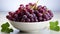 Fresh, ripe grapes in a bowl, nature sweet refreshment generated by AI