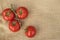 Fresh ripe healthy Vine Tomatoes on a hessian material