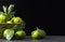 Fresh ripe juicy yellow mandarin  clementine, tangerine  on wooden rustic vintage table with leaf