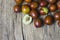 Fresh ripe jujube fruits on wooden rustic background