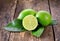Fresh ripe limes on wooden
