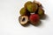 Fresh ripe litchi, lichee, lychee, or Litchi chinensis, shallow focus with white background