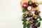 Fresh ripe mangosteen fruits on white wooden table, flat lay. Space for text