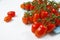 Fresh ripe mini marzano tomatoes on blue board