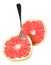 Fresh, ripe, organic grapefruit with spoon isolated.