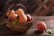 Fresh ripe peaches in a wicker basket