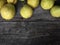 Fresh ripe pear on the gray old wooden background