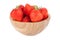 Fresh ripe perfect strawberry in wooden plate.