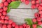 Fresh ripe raspberries on wooden table