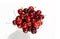 Fresh ripe red cherries berries in vintage crystal vase on a white background top view picture