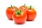 Fresh ripe red tomatoes on the white background. Harvested tomatoes on white background