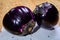 Fresh ripe sicilian purple globe Violetta eggplants vegetables ready to cook, healthy Italian food