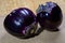 Fresh ripe sicilian purple globe Violetta eggplants vegetables ready to cook, healthy Italian food