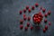 Fresh ripe sweet cherries on dark rustic background. Top view with copy space.